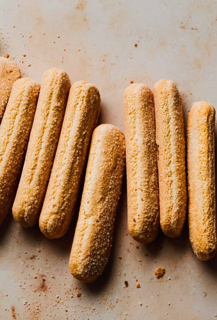 lady fingers on beige background