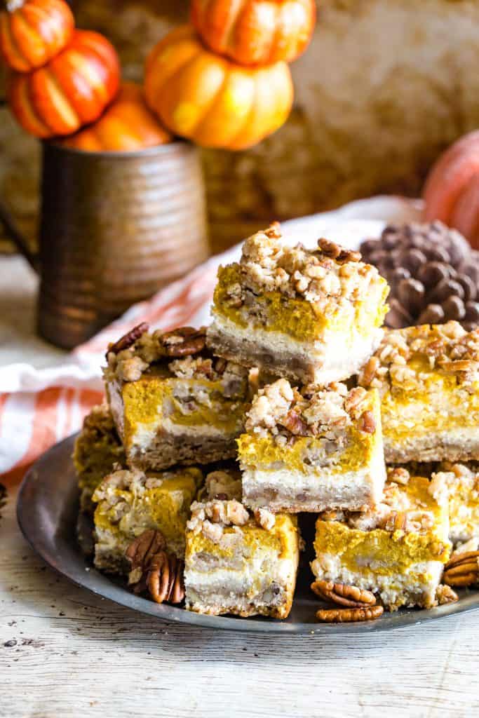 plate of pumpkin cream cheese bars