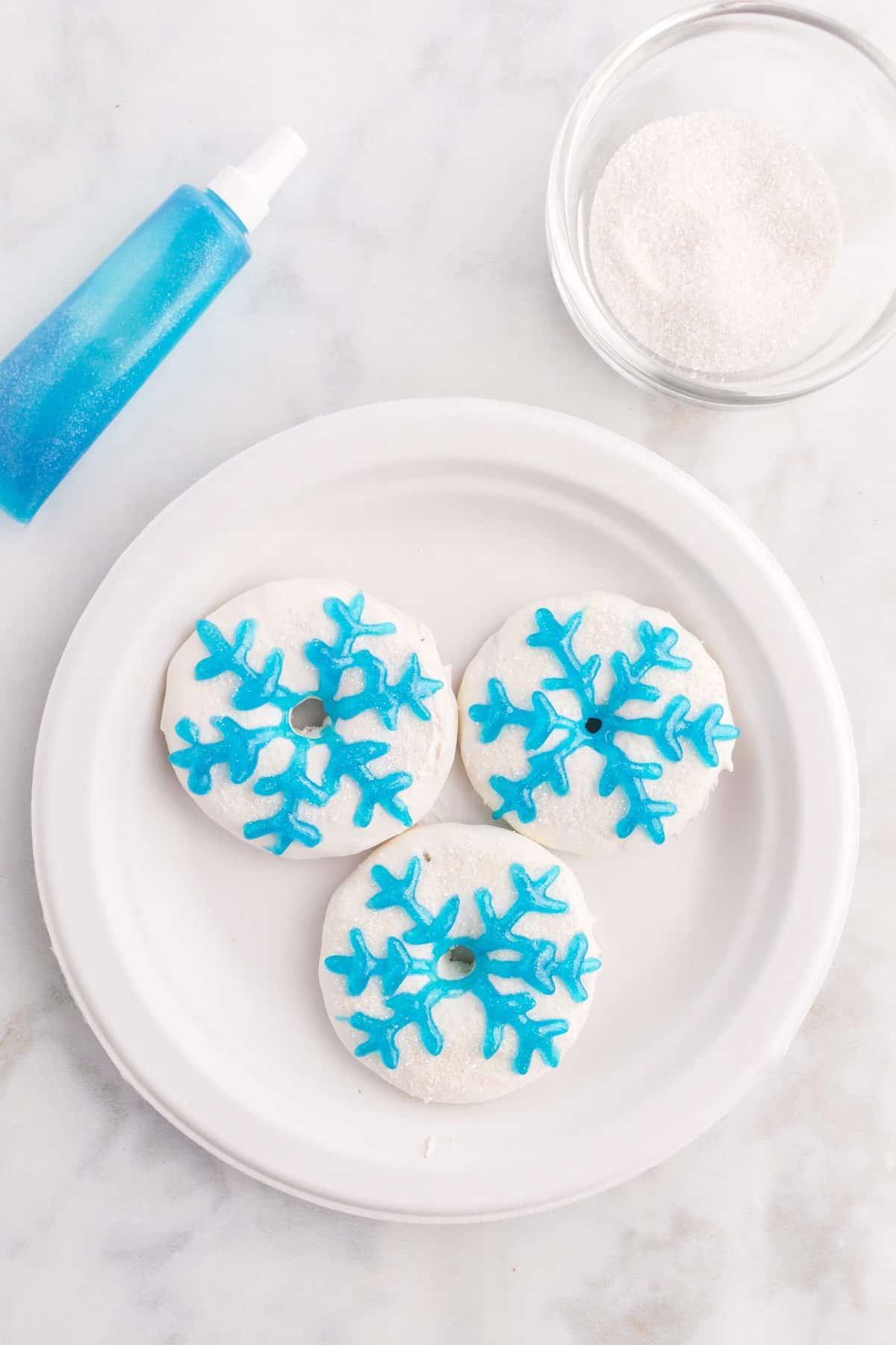 white and blue snowflake Christmas cookies