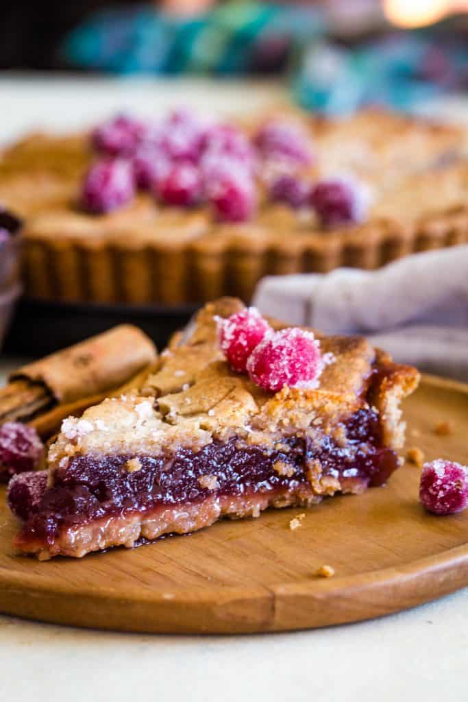 left over cranberry sauce tart slice on wood plate