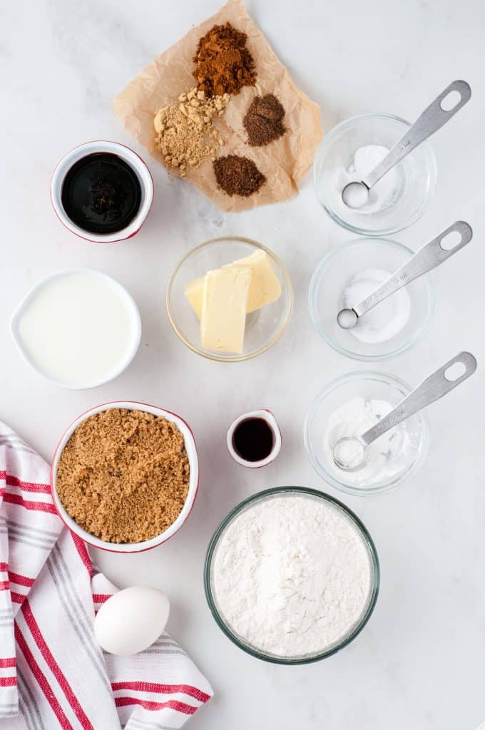 ingredients for gingerbread cookie bars on white background