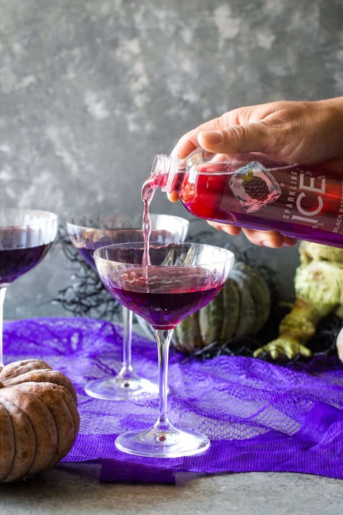 pouring sparkling ice into glass