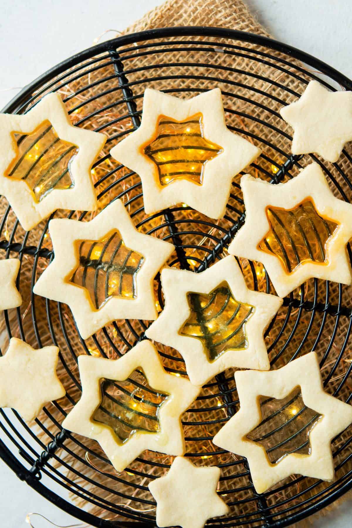 Christmas stained glass sugar cookies on wire rack