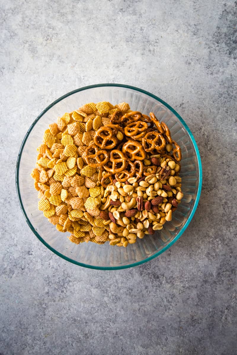 bowl of cereal, nuts, pretzels for rosemary garlic Chex mix