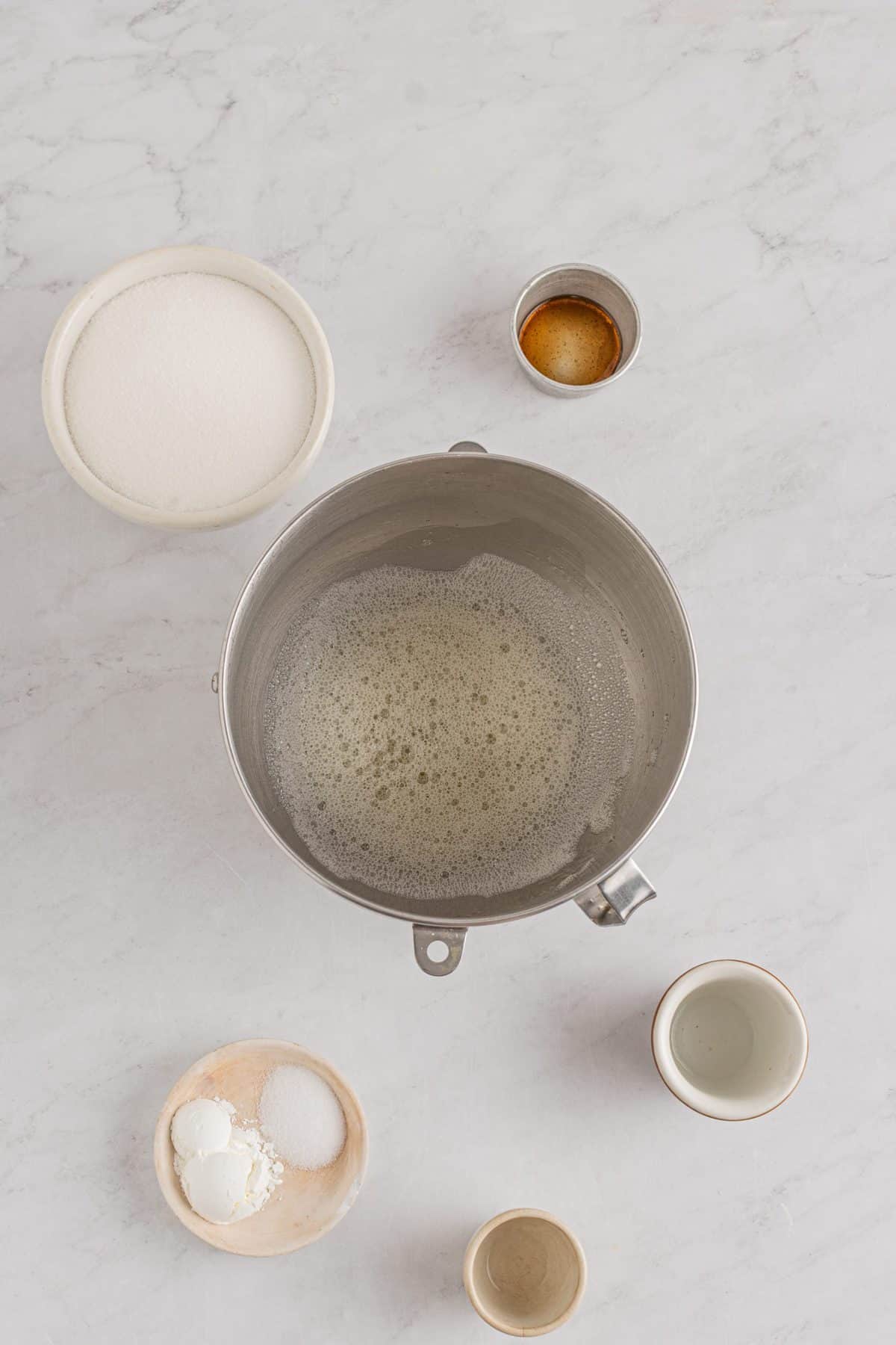 making the egg white froth in metal bowl