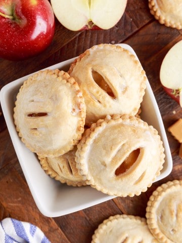 overhead shot of caramel apple hand pies and sliced apples