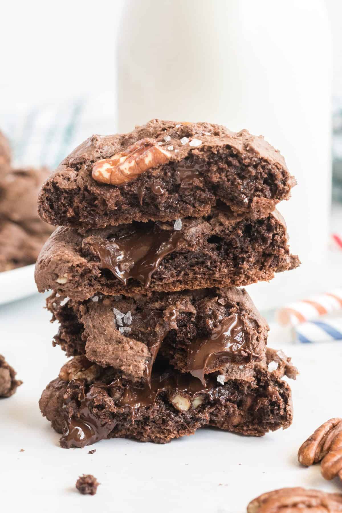 Up close photo of the chocolate cookies broken in half and stacked. 