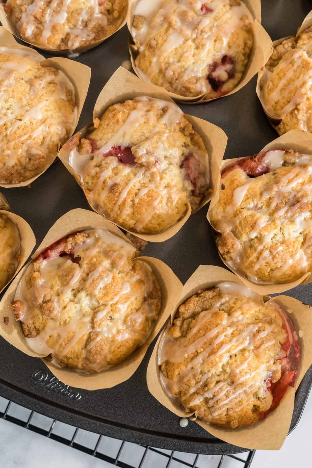 Up close photo of baked muffins in muffin tin. 