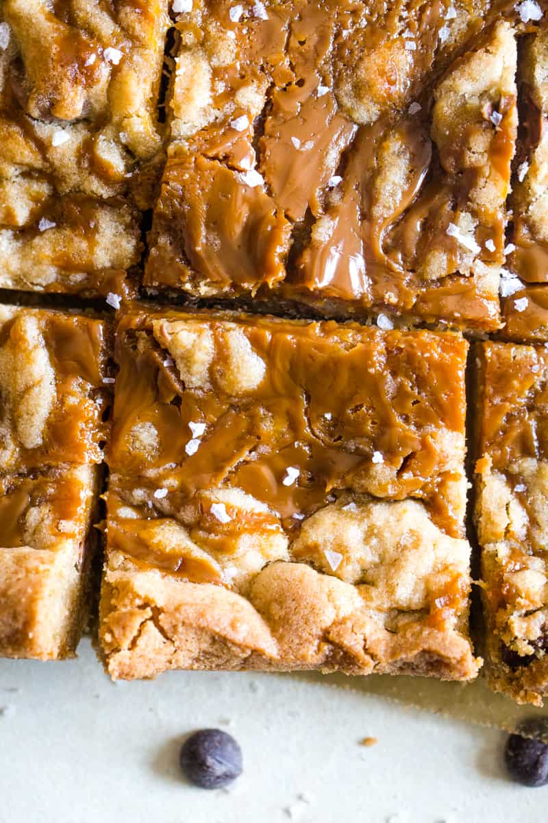 Overhead shot of salted caramel cookie bars cut into squares