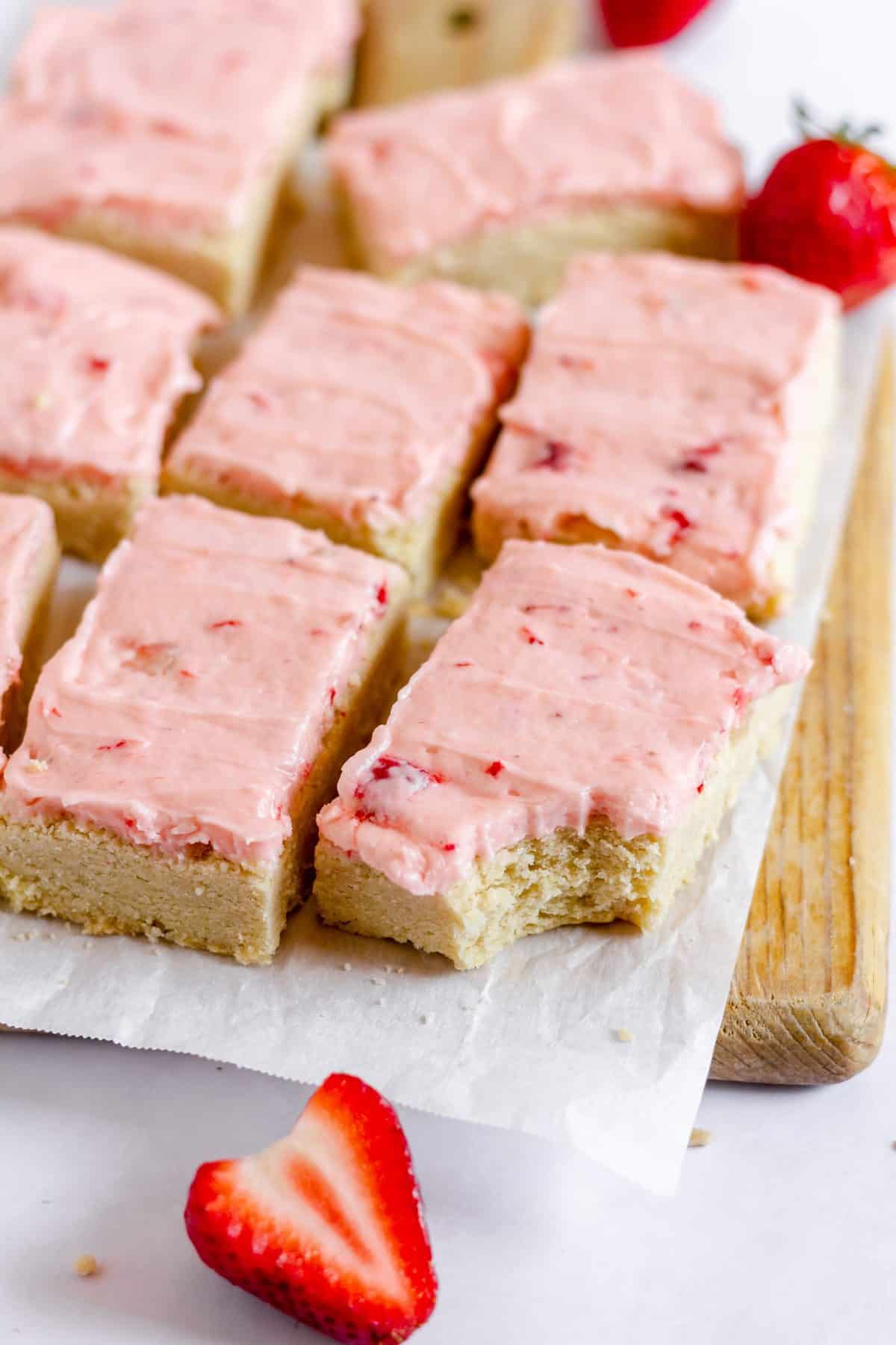 https://theseasidebaker.com/wp-content/uploads/2022/04/Sugar-Cookie-Bars-with-Fresh-Strawberry-Icing-18-1-scaled.jpg