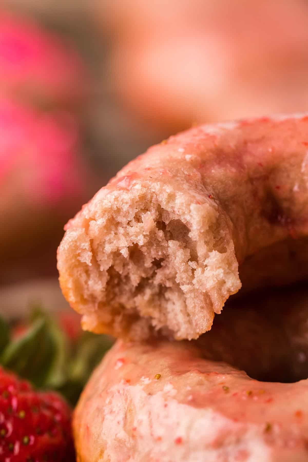 Up close photo of the fluffy moist texture of the inside of the donut.