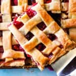square image of a square of cherry slab pie with lattice crust.