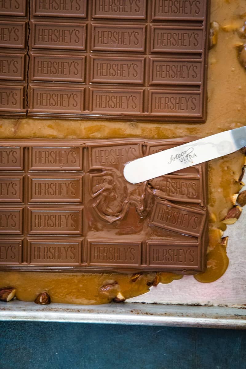 Spreading the melted chocolate with a small offset spatula